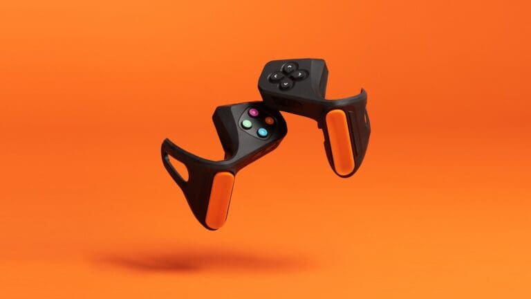 Die beiden Zwift Play Game-Controller. Navigiert wird mit den Knöpfen, gesteuert und gebremst wird mit der orangen Druckleiste